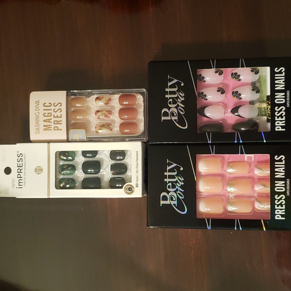 Set of Four Brand New Reusable Nails